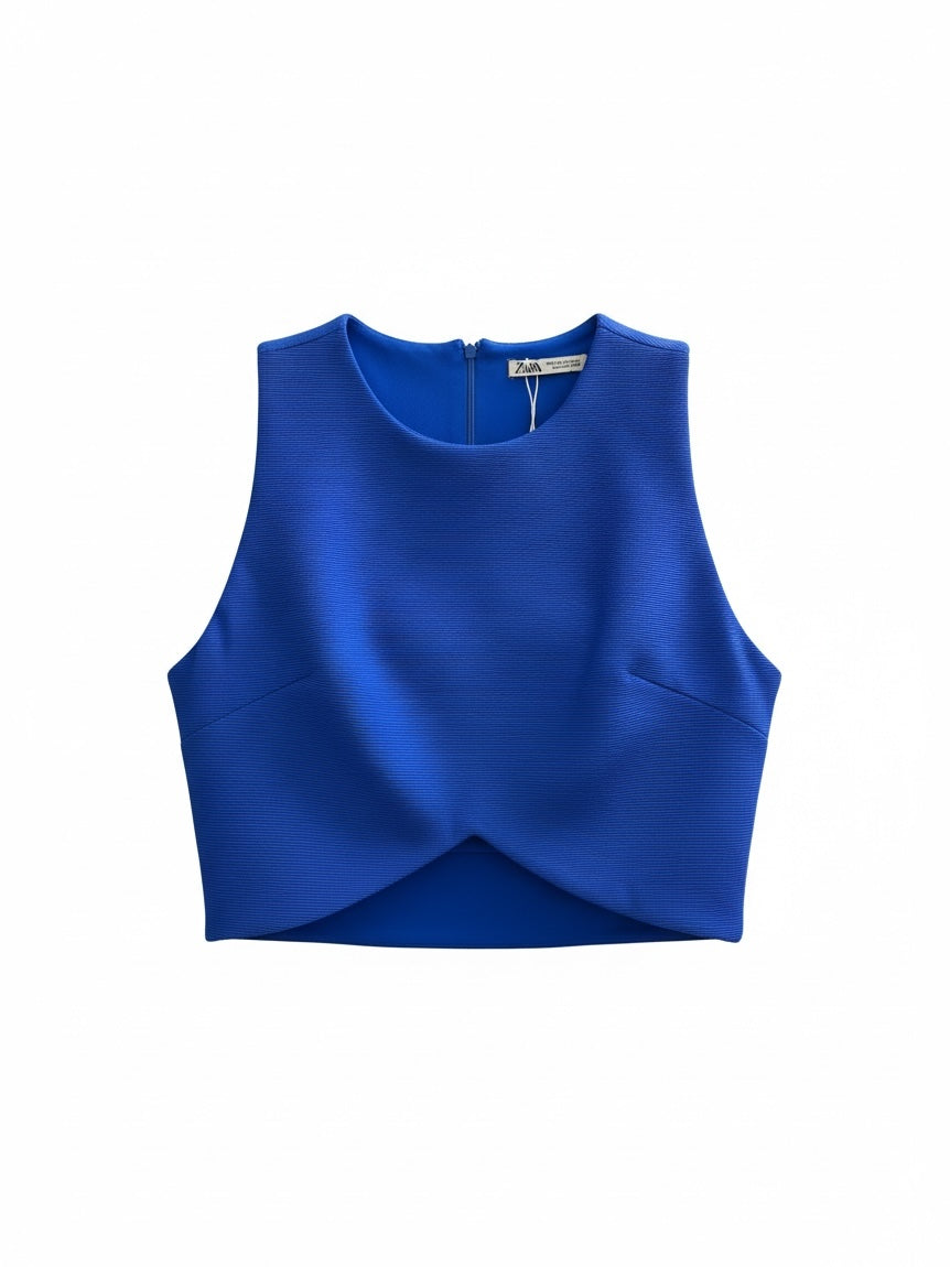 The Circle ZARA royal blue sleeveless cropped top with front cut-out detail and textured fabric finish.