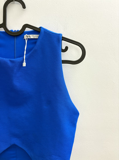 The Circle ZARA royal blue sleeveless cropped top with textured fabric and front cut-out detail on a black hanger